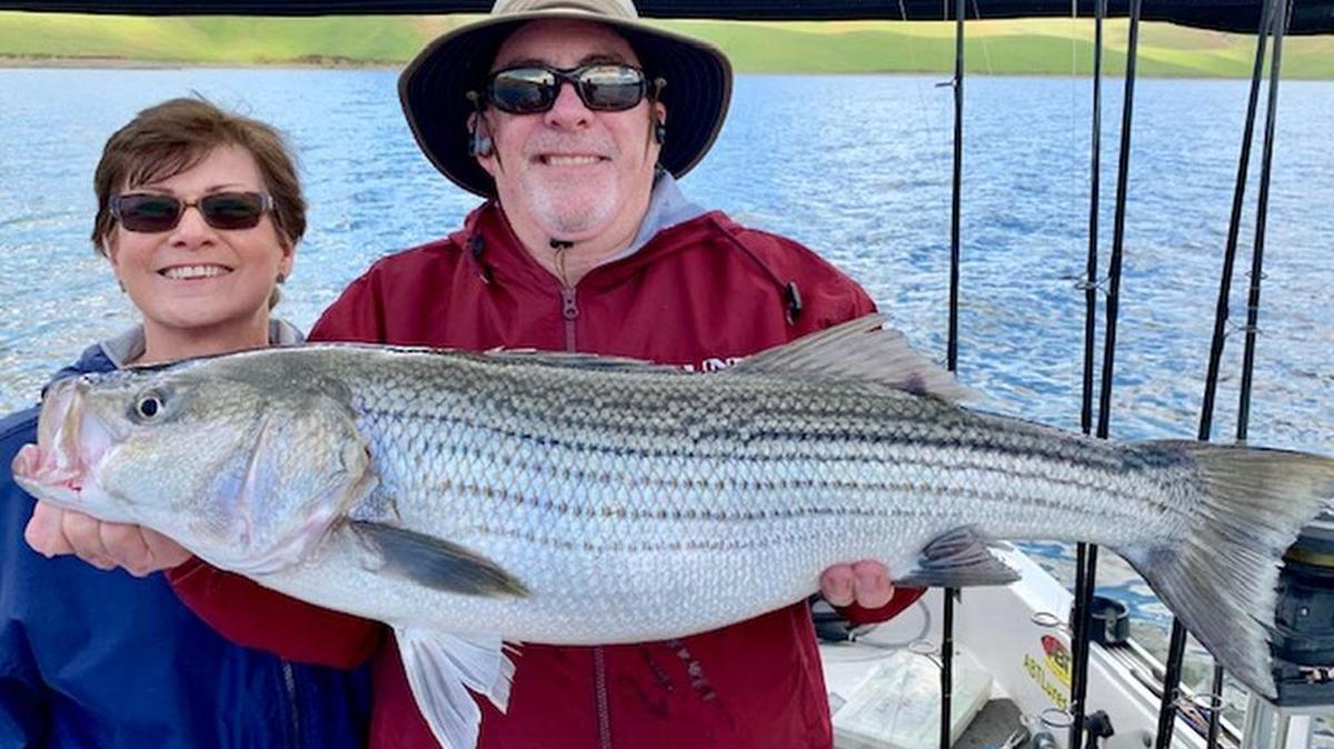 Chuck and Patty Crumbly had an “epic day” April 16 at San Luis Reservoir, according to Roger George. Here, Chuck Crumbly holds his personal-best 14-pound striper. An hour later, Patty Crumbly caught one the same size, her personal-best, too. The trip produced 50 caught-and-released fish.
