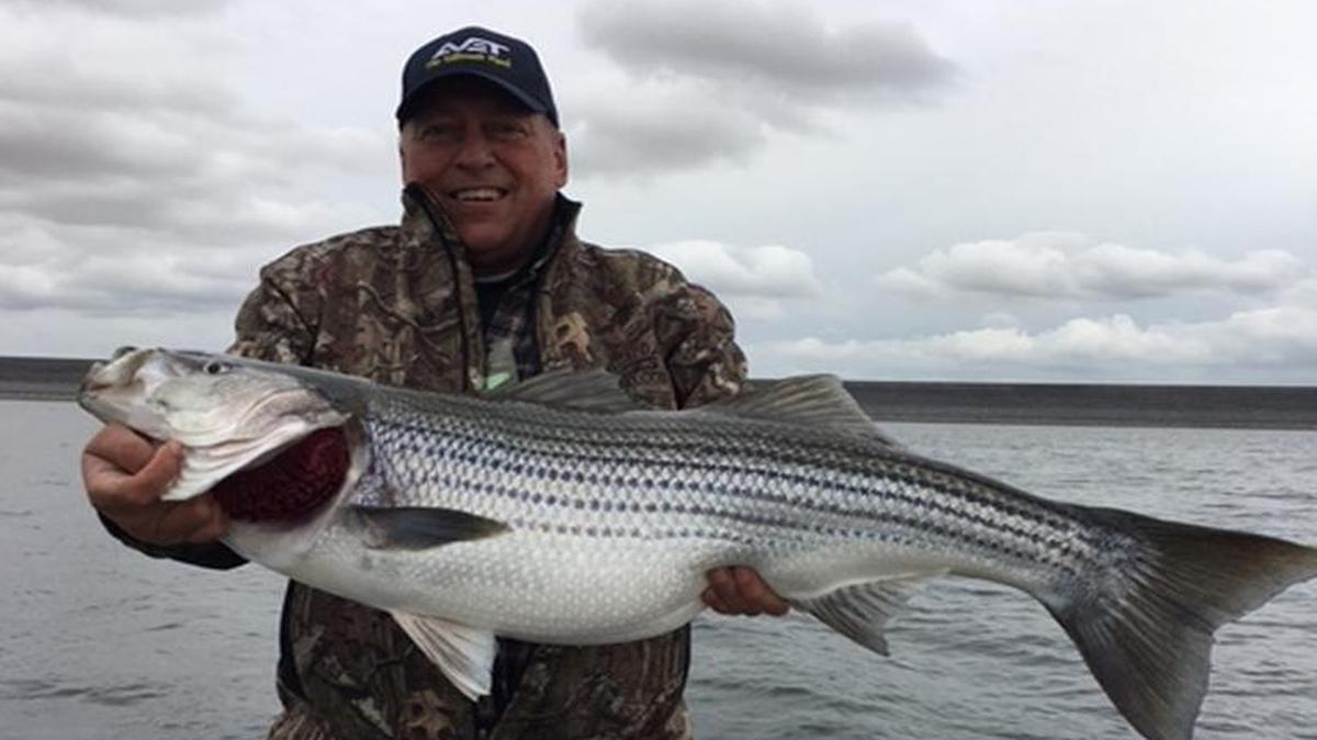 Marco Vuicich and central Valley guide/Bee fishing expert Roger George fished in rain Saturday at San Luis and got the big bite they were looking for from this 22-pounder.
