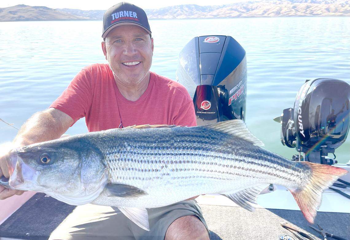 John Turner of Fresno holding the 18½ pound, 36½ long San Luis striper he caught and released using the Seaqualizer tool on Sept. 19, 2025.
