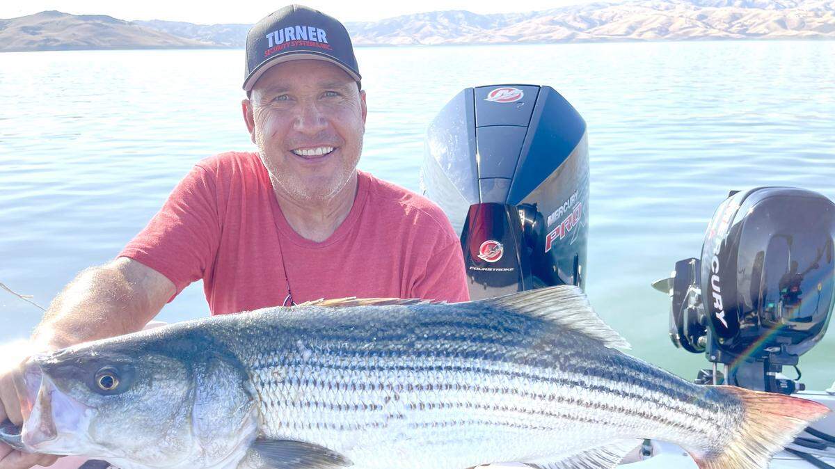 John Turner of Fresno holding the 18½ pound, 36½ long San Luis striper he caught and released using the Seaqualizer tool on Sept. 19, 2025.