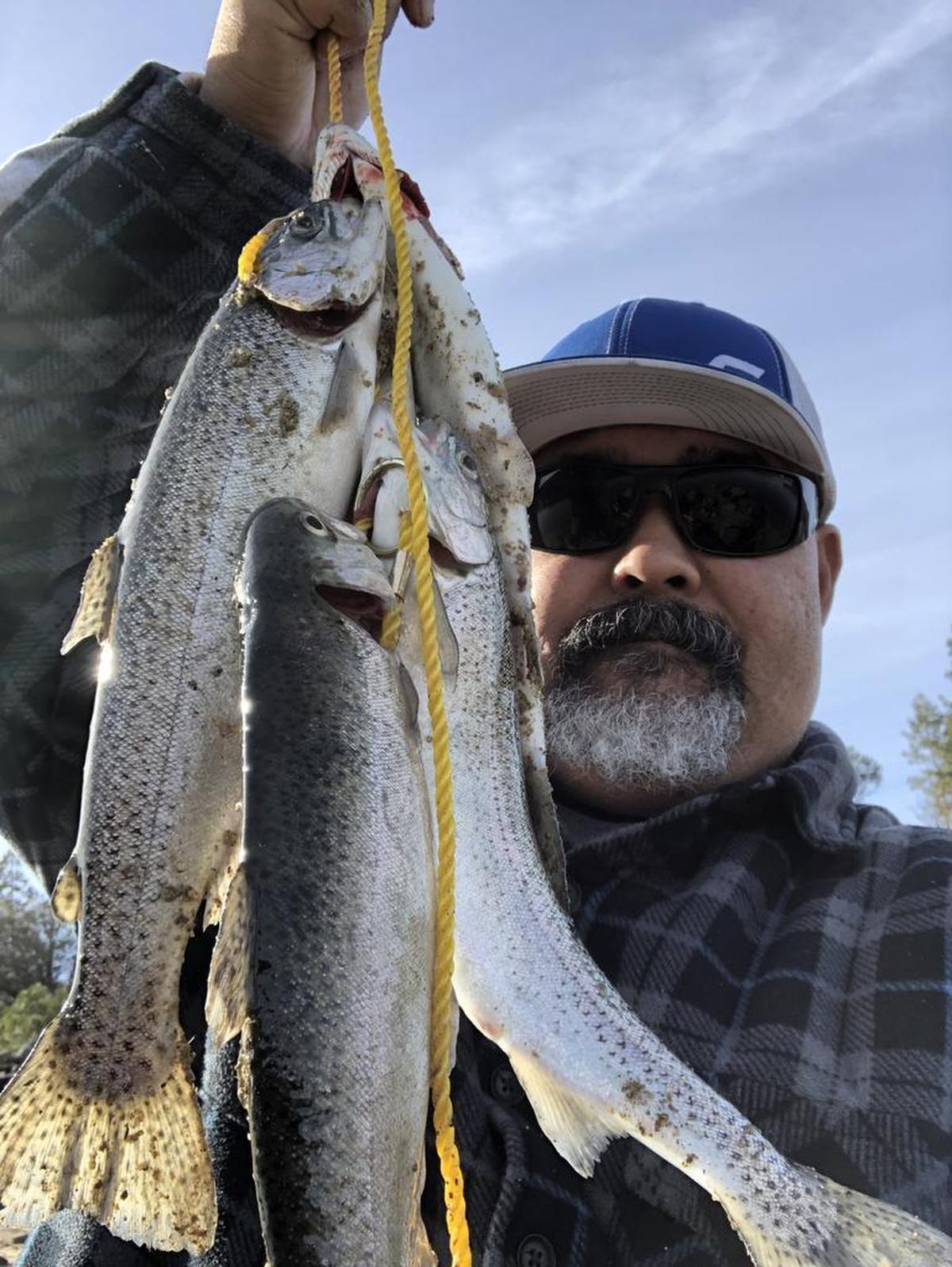 David Aquino shows off his recent stringer caught at Bass Lake.