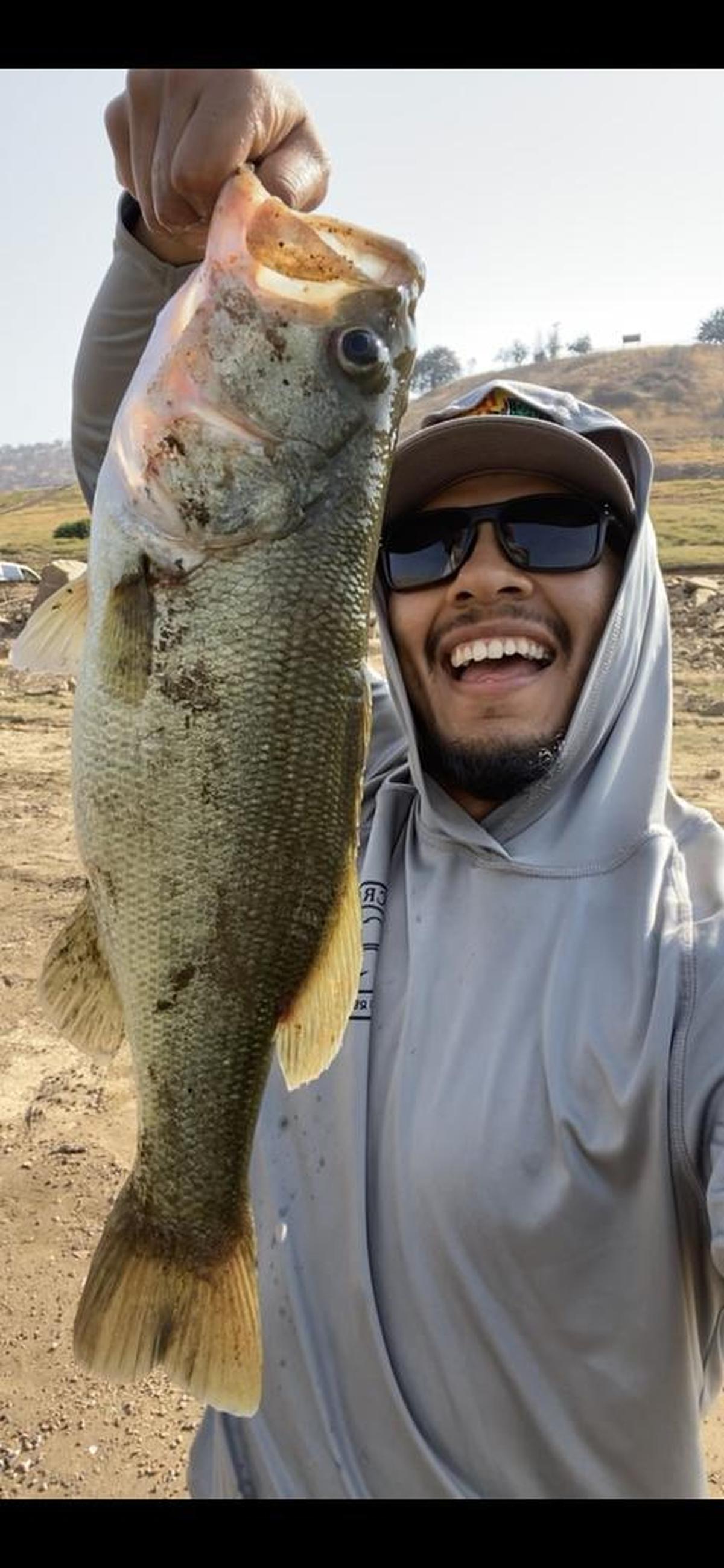 Isaac Gamboa shows off his catch at Lake Kaweah.