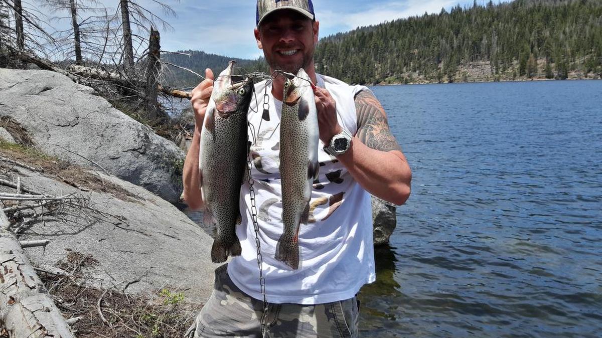 Ryan Emerson shows off two rainbow trout caught June 9 at Huntington Lake measuring 18 and 19 inches long and 3 1/2 and 4 1/2 pounds. He used spinners.