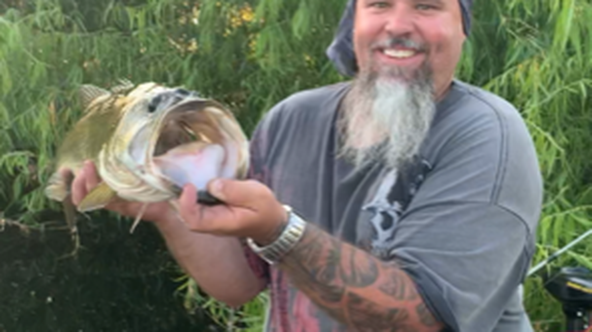 Brian Avila shows off a 7 1/2-pounder caught at Lake Success.