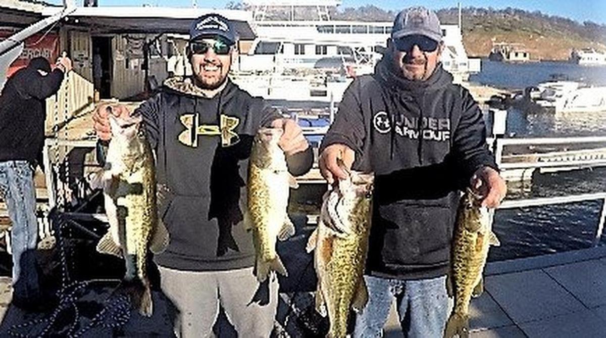 Jim and Chad Oliver show off their winning catch at the Jan. 12 Christian Bass League tournament at Lake Don Pedro.