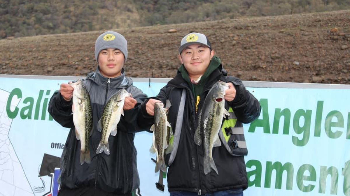 Jacob Lee and Teng Cha of the Roosevelt High School Bass Fishing Club show off their catch at the California Student Angler Tournament Trail Big Valley Open held Dec. 8 at Pine Flat Lake. The Roosevelt team finished second.