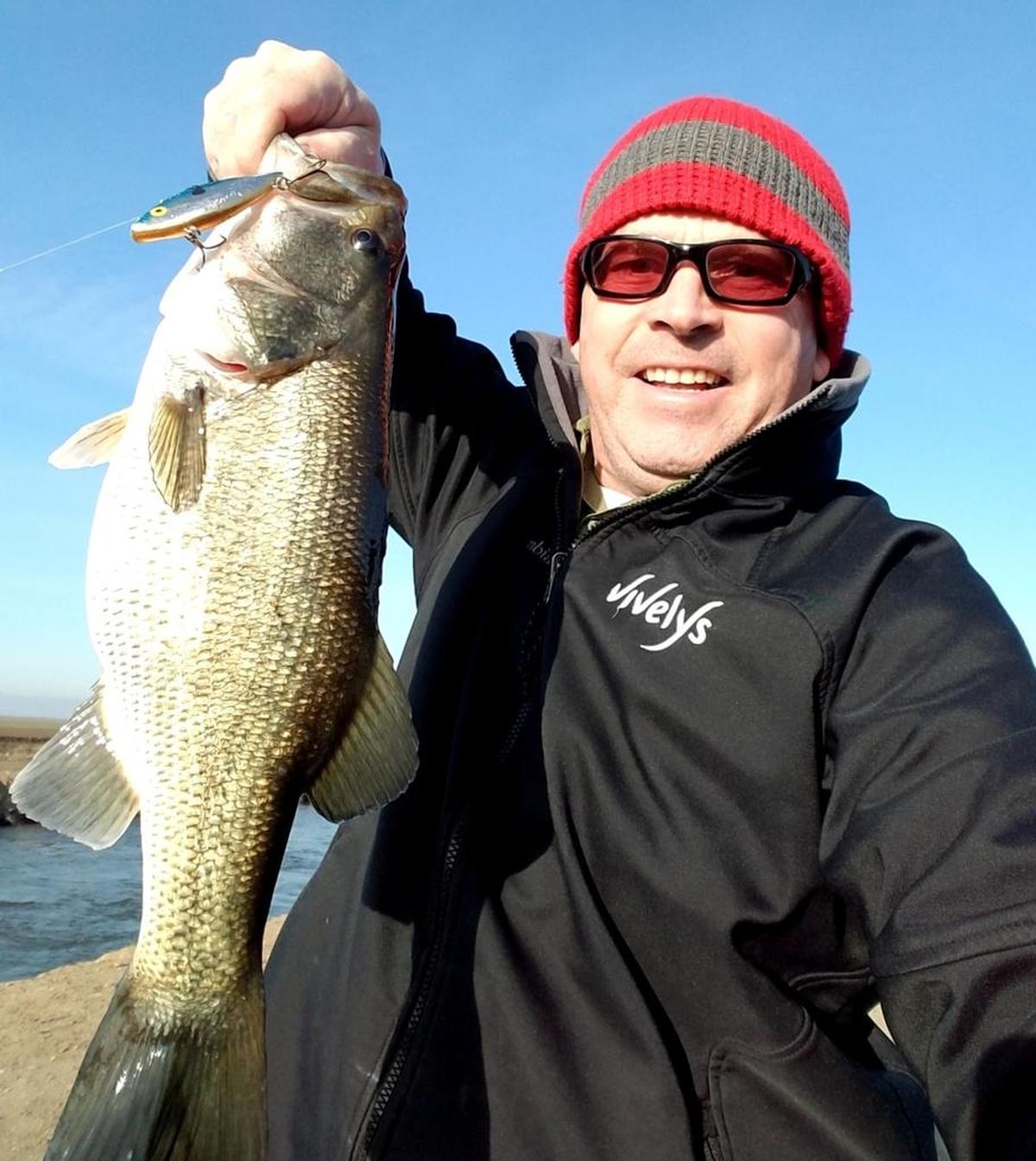 Michael Borboa shows off his catch Feb. 12 in a small canal west of Firebaugh. He says he reeled the striper in at 8:34 a.m., using a Rat-L-Trap lure. It weighed 5 pounds 4 ounces and was released. “The shad are starting to school up as water deliveries to the smaller canals has begun,” Borboa says.