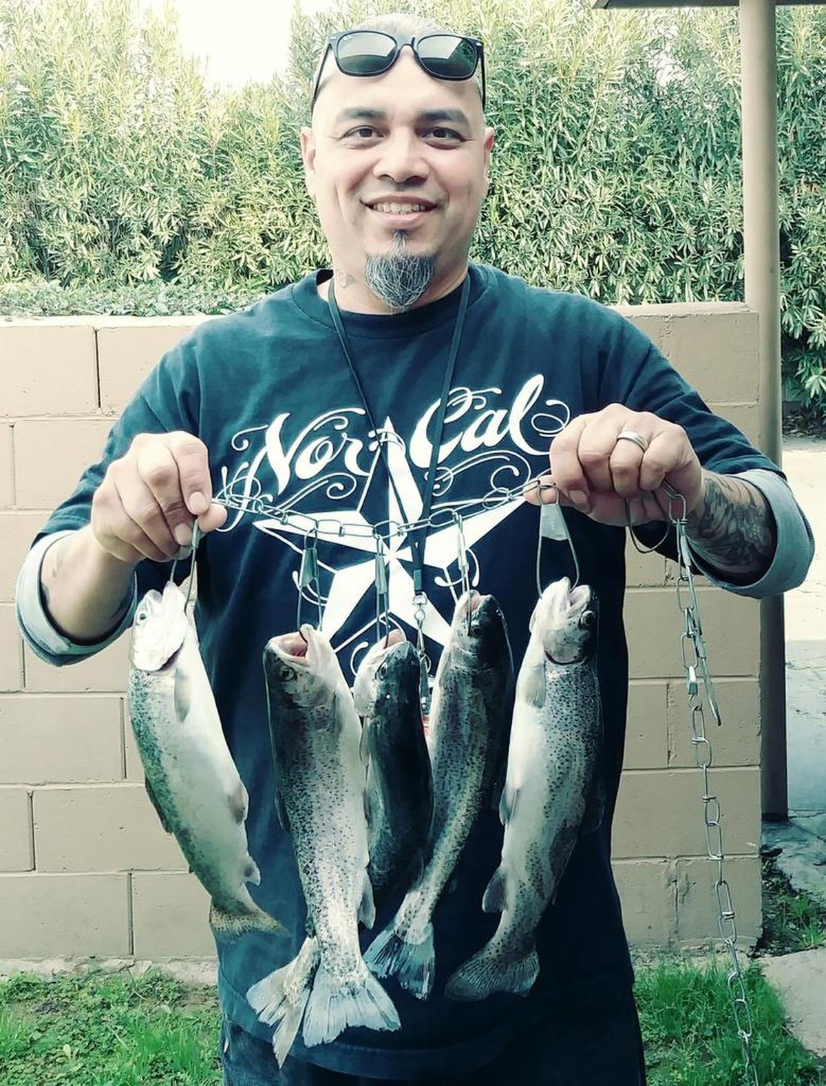 Joe Alvarado Jr. shows off his limit caught working the banks at Bass Lake.