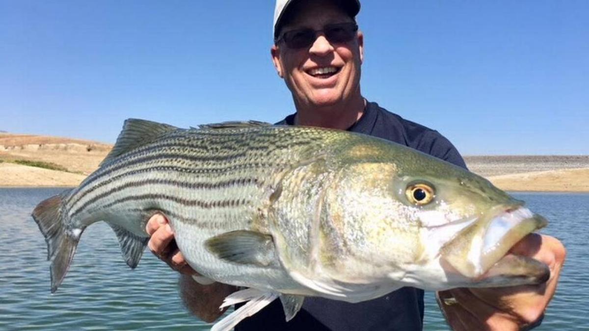 Roger George shows off a catch at San Luis Reservoir in this undated photo. He recently got back on the water after a relatively long layoff and describes the gamut of emotions.