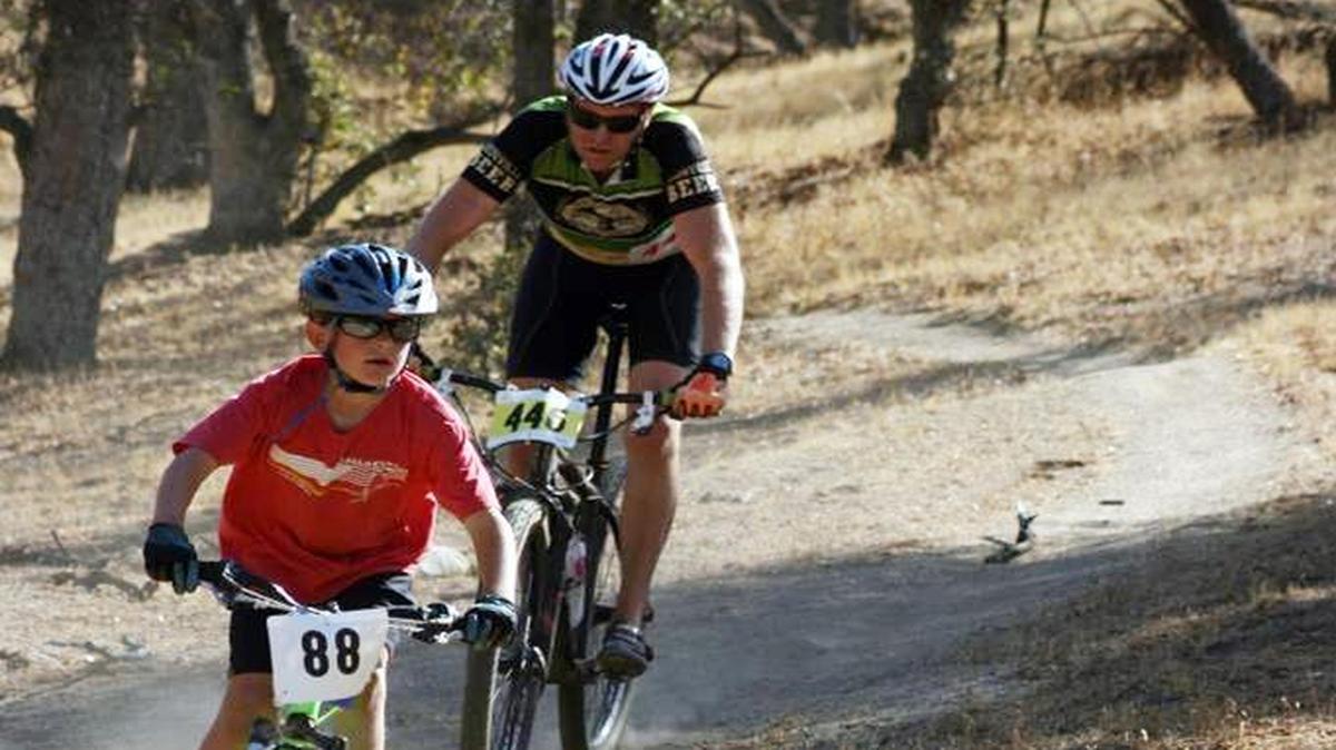 
A young rider leads the way at the Fat Tire Classic during the 2013 Springville Apple Festival. This year’s 17th annual mountain bike race along the Tule River will be held Sunday, Oct. 18 at 10 a.m. 

