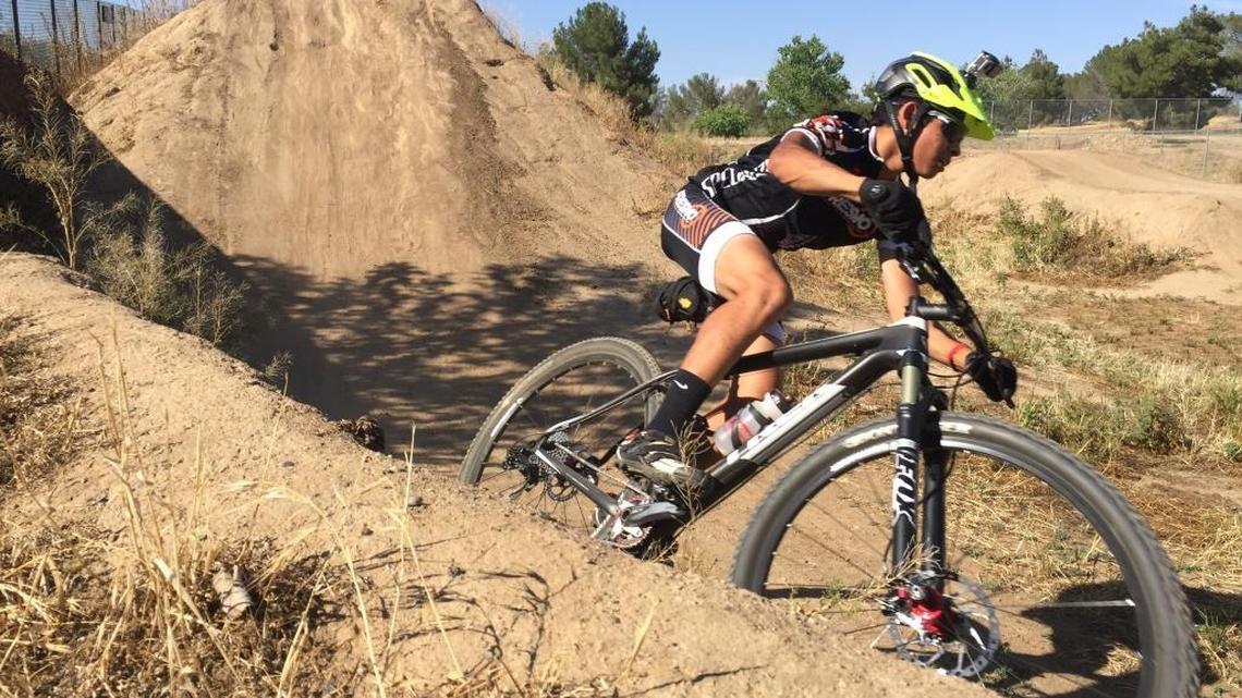 Central High student Michael Hoover practices with the Fresno Composite High School mountain bike team at Woodward Park in 2015. Hoover and four teammates qualified to race at the California State Championships on May 22 in Los Olivos.