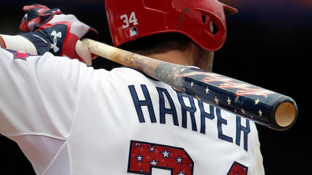 Washington Nationals right fielder Bryce Harper (34) bats with a star-spangled bat during a baseball game against the San Francisco Giants at Nationals Park, Saturday, July 4, 2015, in Washington. Harper homered with the bat and the Giants lost 9-3. The Giants host the Rockies on Monday and look to win their first Fourth of July game since 2009.