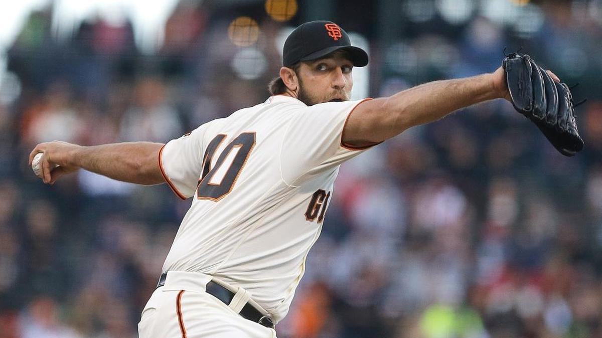 San Francisco Giants pitcher Madison Bumgarner works against the Boston Red Sox during the first inning of a baseball game Wednesday, June 8, 2016, in San Francisco.