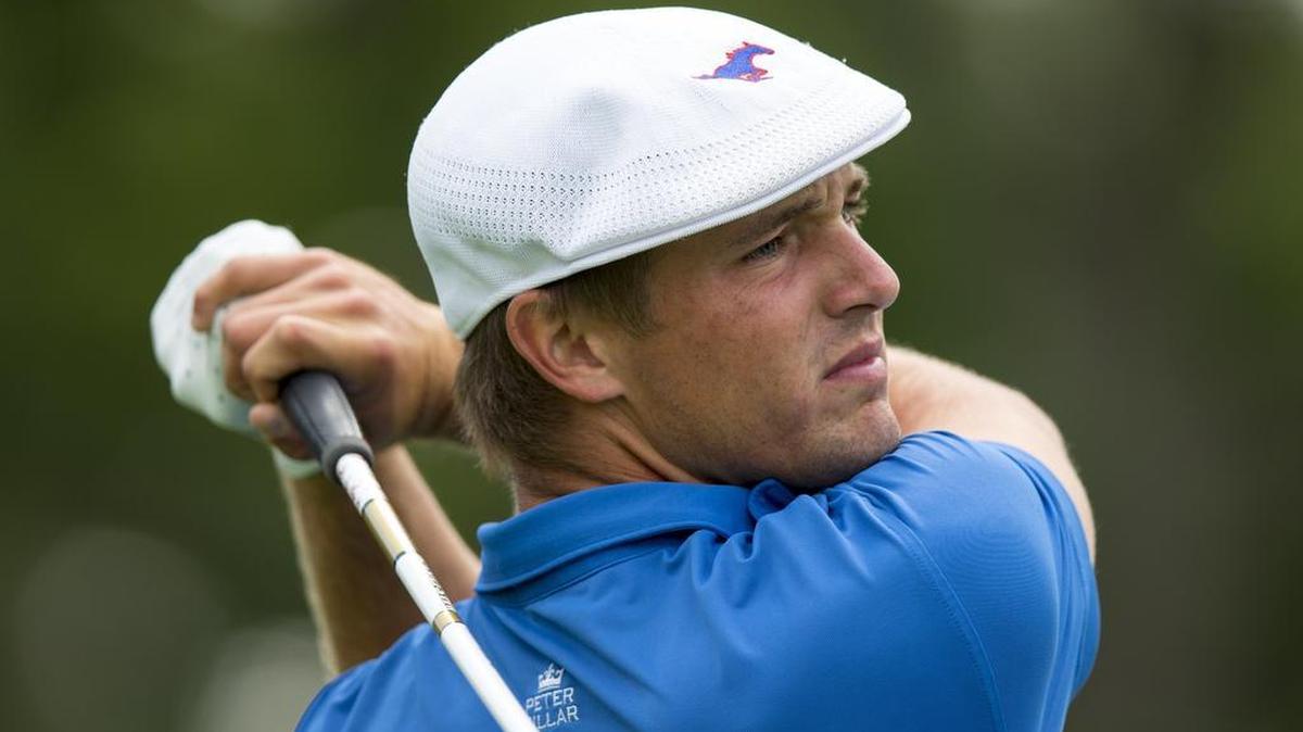 
Bryson DeChambeau watches his tee shot on the 11th hole during competition Thursday at the U.S. Amateur at Olympia Fields Country Club in Olympia Fields, Ill., on Thursday. DeChambeau won two matches Thursday to reach the quarterfinals.
