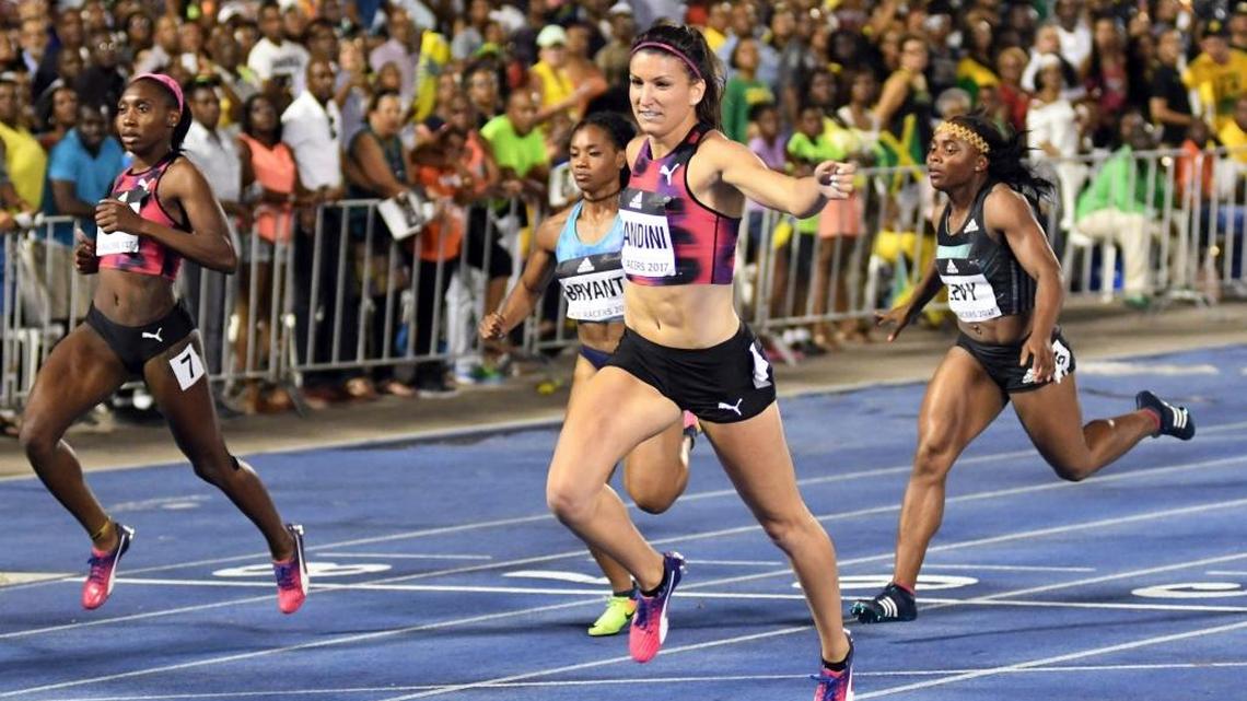 Jenna Prandini, center, is shown winning the women’s 200-meter race during the Racers Grand Prix at the national stadium in Kingston, Jamaica, Saturday, June 10, 2017.