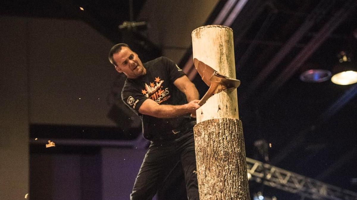 Tollhouse’s Walt Page, 32, chops away during the springboard chop event of the 2016 STIHL TIMBERSPORTS U.S. Professional Championship in Chicago on Saturday, July 16, 2016.