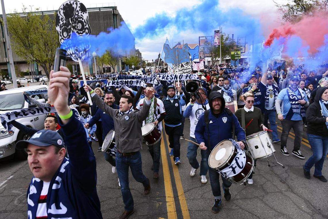 Fire Squad Fresno begins its march from Tioga-Sequoia Brewery before the start of Fresno Football Club’s game against Las Vegas Lights FC Saturday, March 17, 2018 in Fresno.