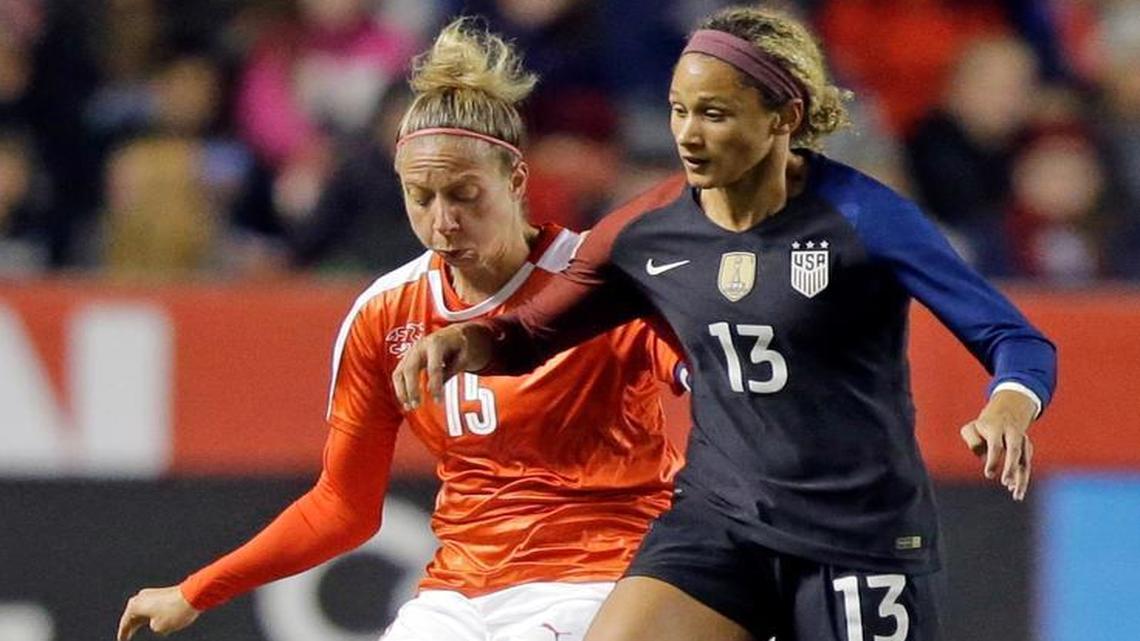 Switzerland’s Caroline Abbe (15) defends Lynn Williams of the U.S. during the second half of an international friendly soccer match Wednesday, Oct. 19, 2016, in Sandy, Utah. Williams, a former Bullard High star, scored 49 seconds into her U.S. national team debut in an eventual 4-0 win.