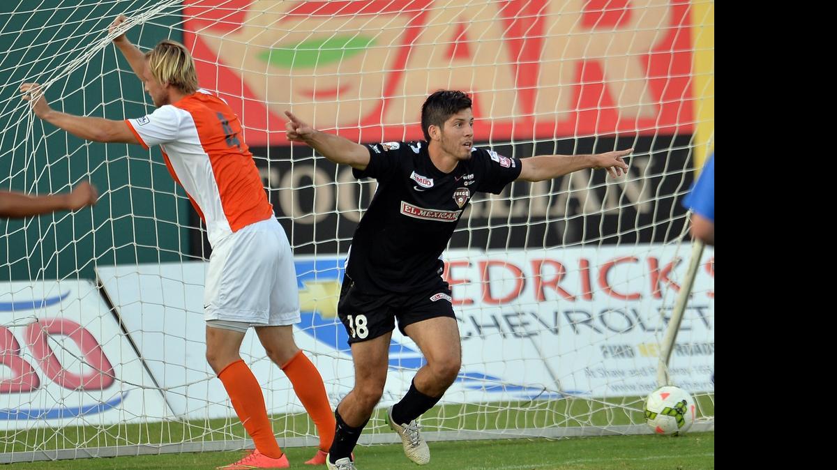 
Fresno Fuego’s Renato Bustamante, right, celebrates his goal against the OC Blues U23 at Chukchansi Park earlier this month. Bustamante was named to the Premier Development League’s All-Western Conference team after leading the Fuego in goals (seven) and assists (four).
