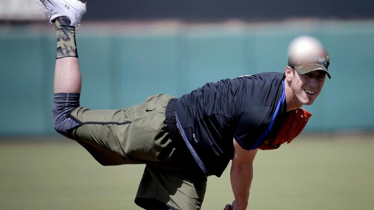 Tim Lincecum throws for MLB baseball scouts Friday, May 6, 2016, at Scottsdale Stadium in Scottsdale, Ariz. The former San Francisco Giants pitcher is a free agent working his way back from hip surgery.