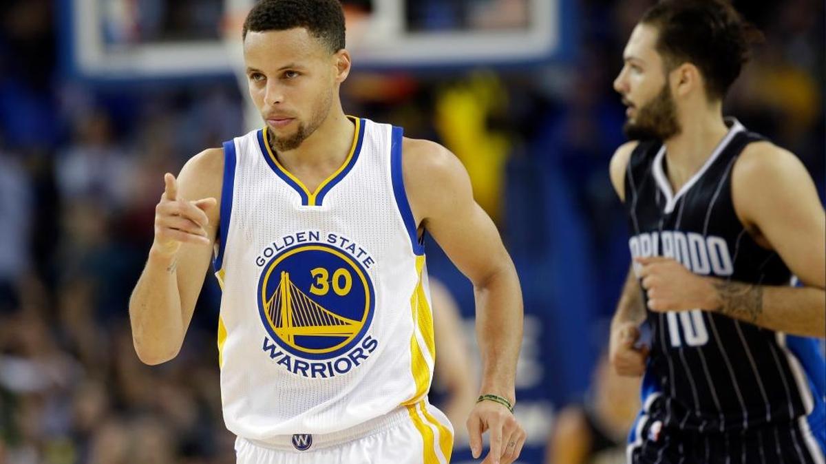 The Golden State Warriors’ Stephen Curry (30) gestures after scoring against the Orlando Magic during an NBA basketball game Monday, March 7, 2016, in Oakland.