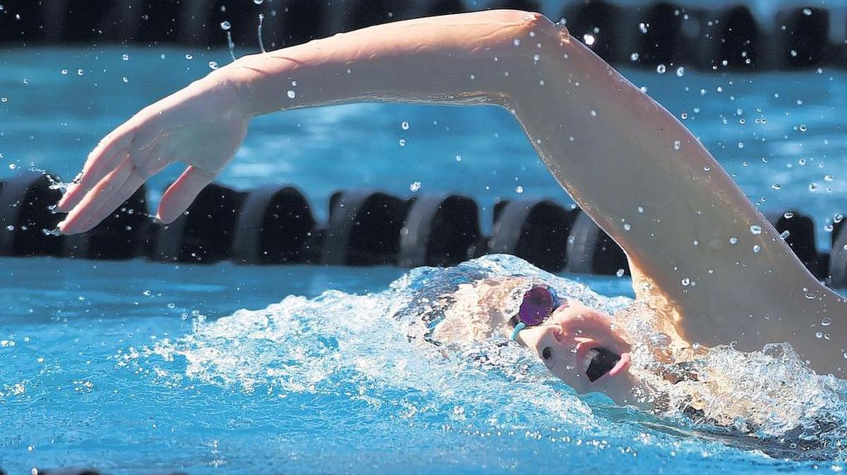 Clovis North’s Claire Tuggle in the Girls 500 Freestyle at the CIF Swimming and Diving Championships at Clovis West on Saturday in Fresno.