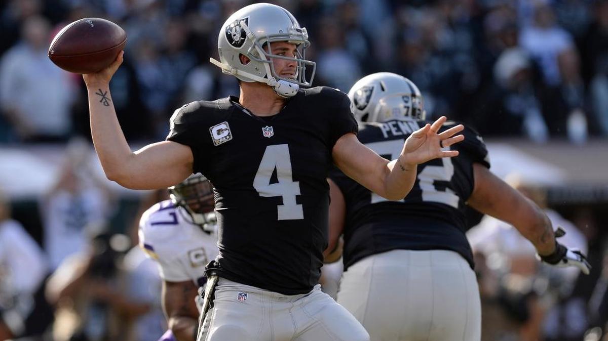 Raiders quarterback Derek Carr fires off a pass against the Vikings during the first quarter on Nov. 15 at O.co Coliseum. Carr threw two interceptions in the game, giving him six on the season, as Oakland fell 30-14 for its first back-to-back losses of the season.