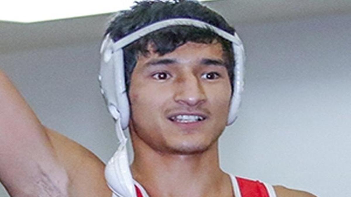 Fresno City College sophomore Julian Gaytan, seen after a victory in a regular-season match, won the state 125-pound title Saturday, Dec. 10, 2016 to help the Rams win their first team championship since 2012.