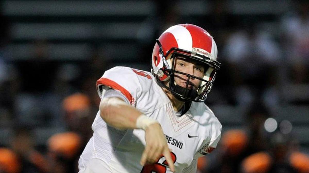 Fresno City College quarterback Christian Rossi passes against Reedley College on Oct. 3 in Reedley. The sophomore has been one of the best in the state, throwing for 2,359 yards and 25 touchdowns this season.