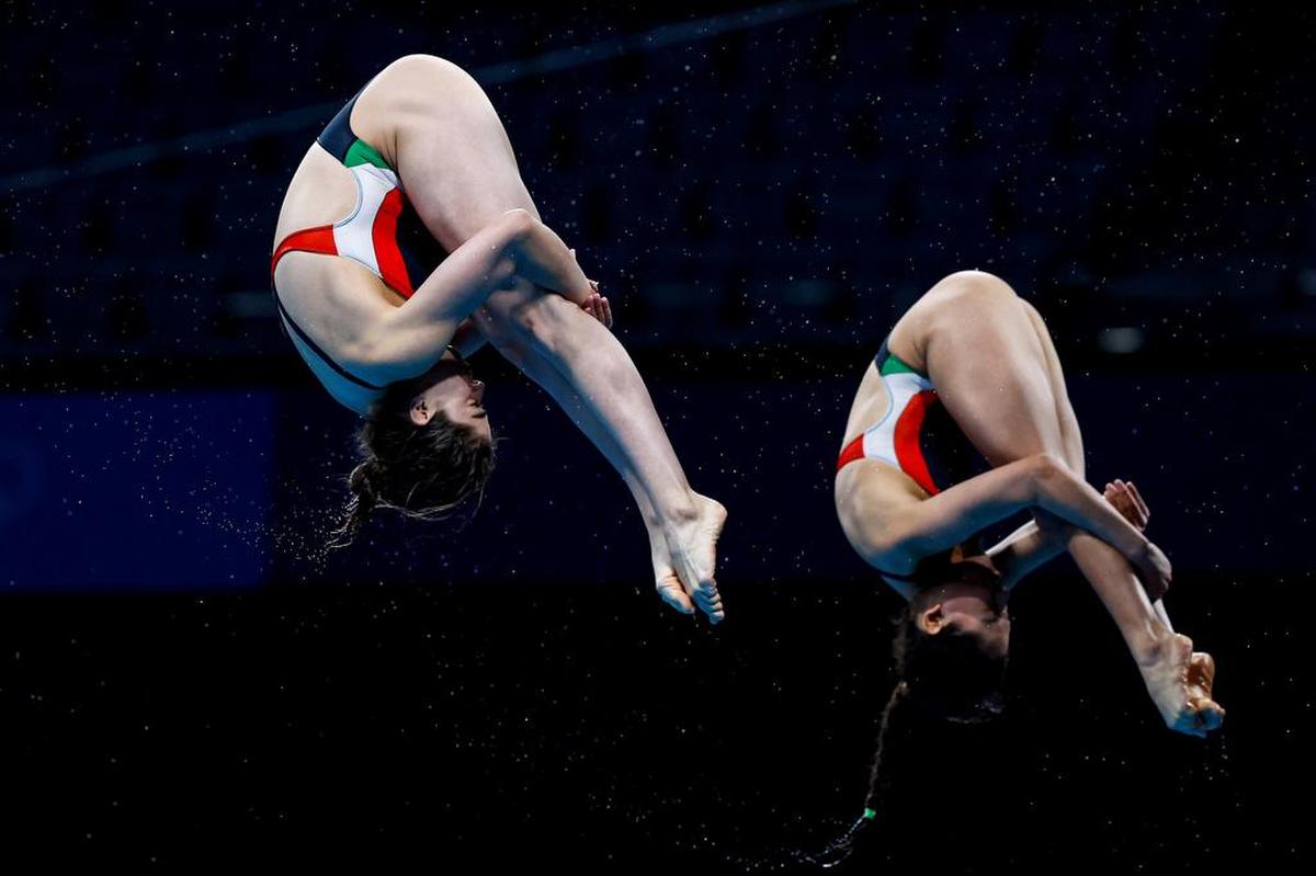 Gabriela Agúndez García and Alejandra Orozco Loza of México perform in the women’s 10-meter synchronized platform diving final at the Tokyo 2020 Olympic Games at the Tokyo Aquatics Centre in Tokyo.