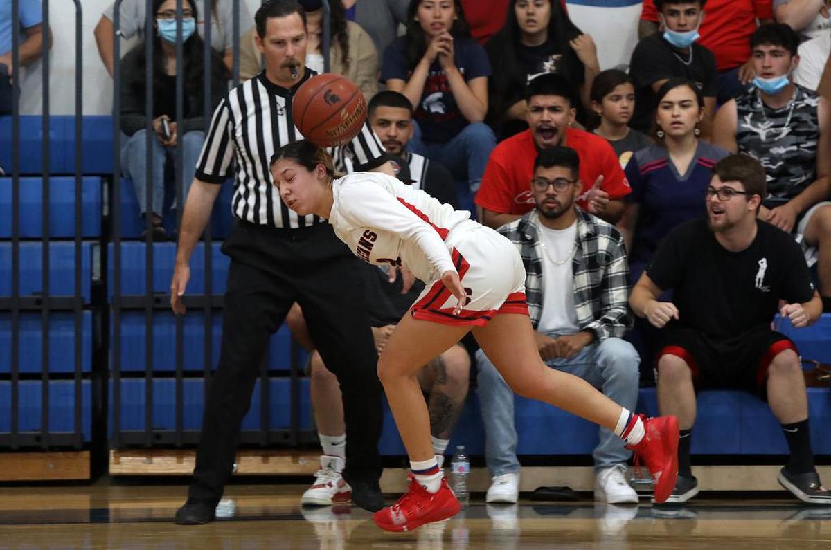 Strathmore High senior guard Jazmine Soto loses sight of the ball in her team’s 73-60 win over Corcoran to win the CIF Central Section Division V girls basketball championship on June 10, 2021.