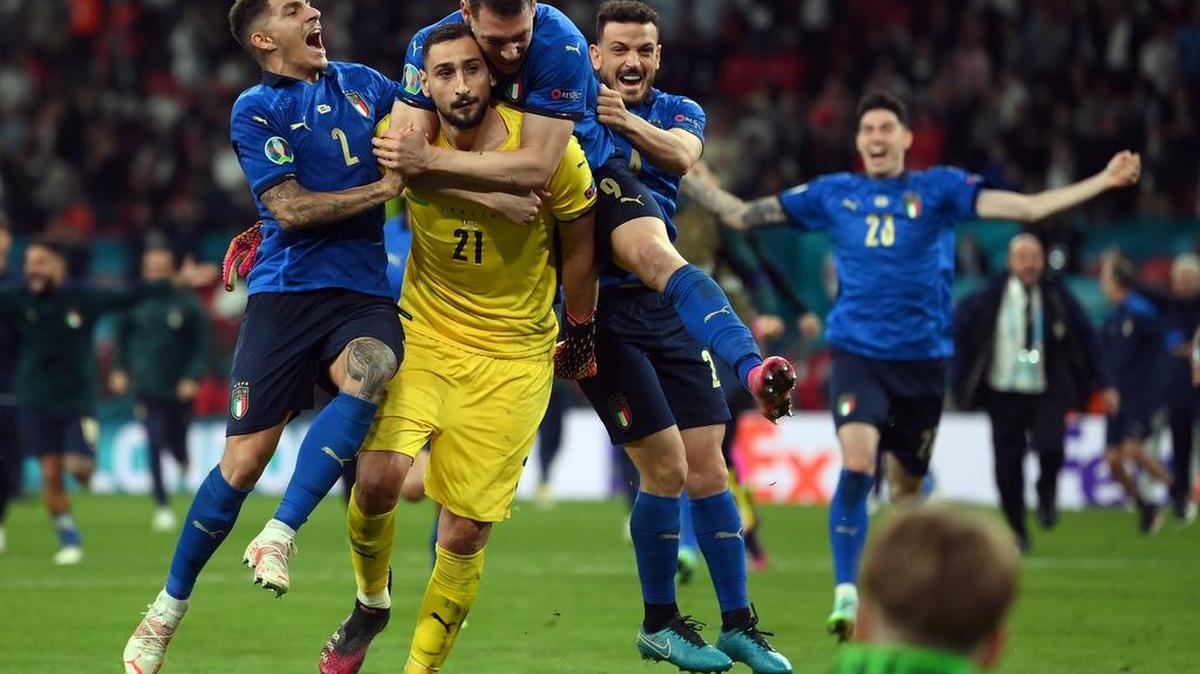 Players of Italy celebrate after winning the UEFA EURO 2020 final between Italy and England in London.