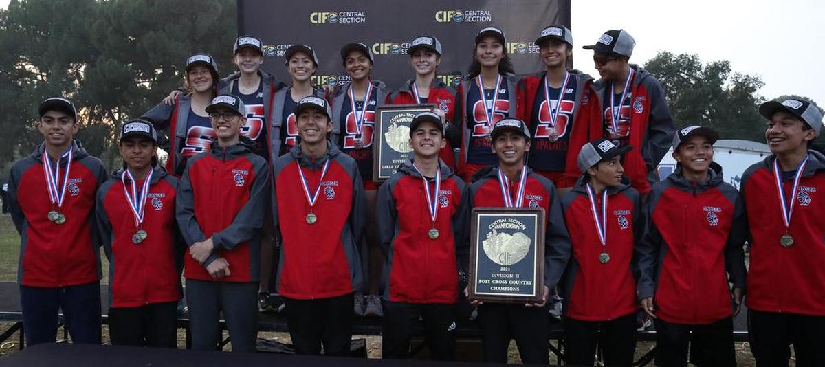 The Sanger High boys and girls cross country teams grabbed the CIF Central Section Div. II championships on Nov. 18, 2021 at Woodward Park.