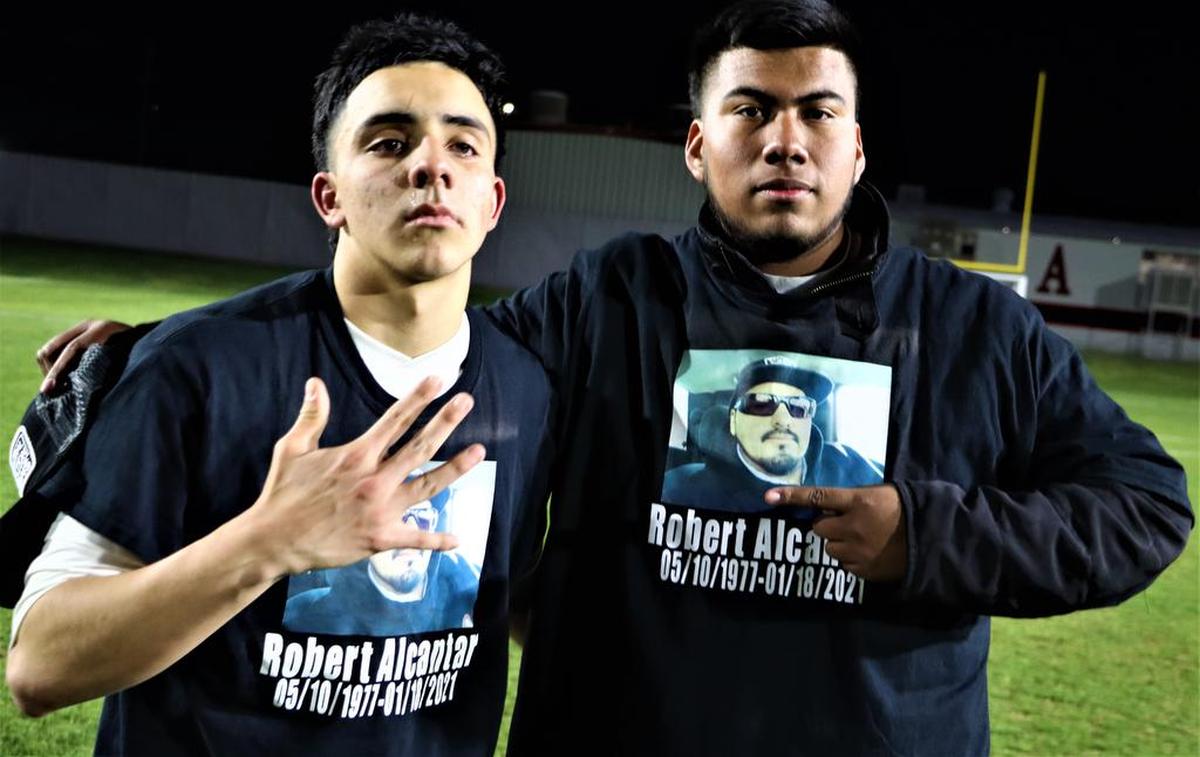 Reedley High forward Levy Alcántar and his friend Diego Chávez sport T-shirts honoring Alcántar’s father, who died last year.