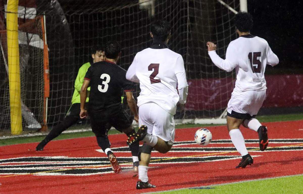McLane High sophomore Guillermo ‘Memo’ Martínez slipped a goal past the Chávez High defense to open the scoring of what became a 3-2 overtime win by McLane over visiting Chávez High for the CIF Central Section Division III boys championship on Feb. 24, 2023.