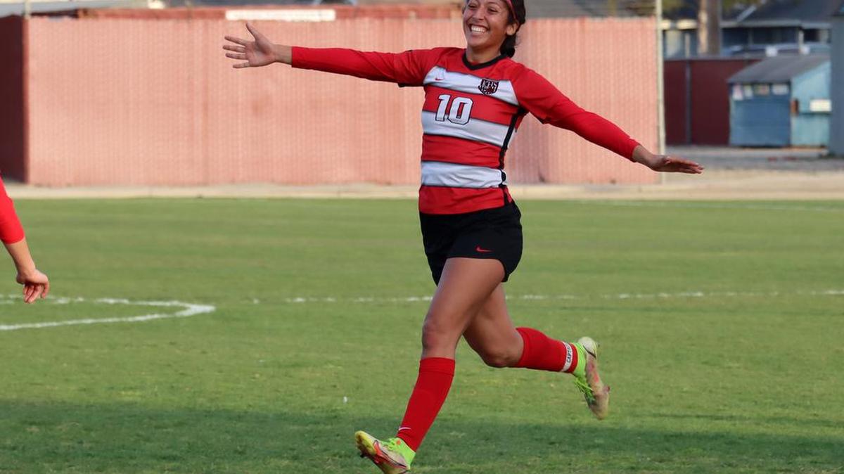 Kerman High senior Isabella Cruz celebrates her first-half goal against Salinas High in the first round of the Northern California Division IV regionals on March 1, 2022.