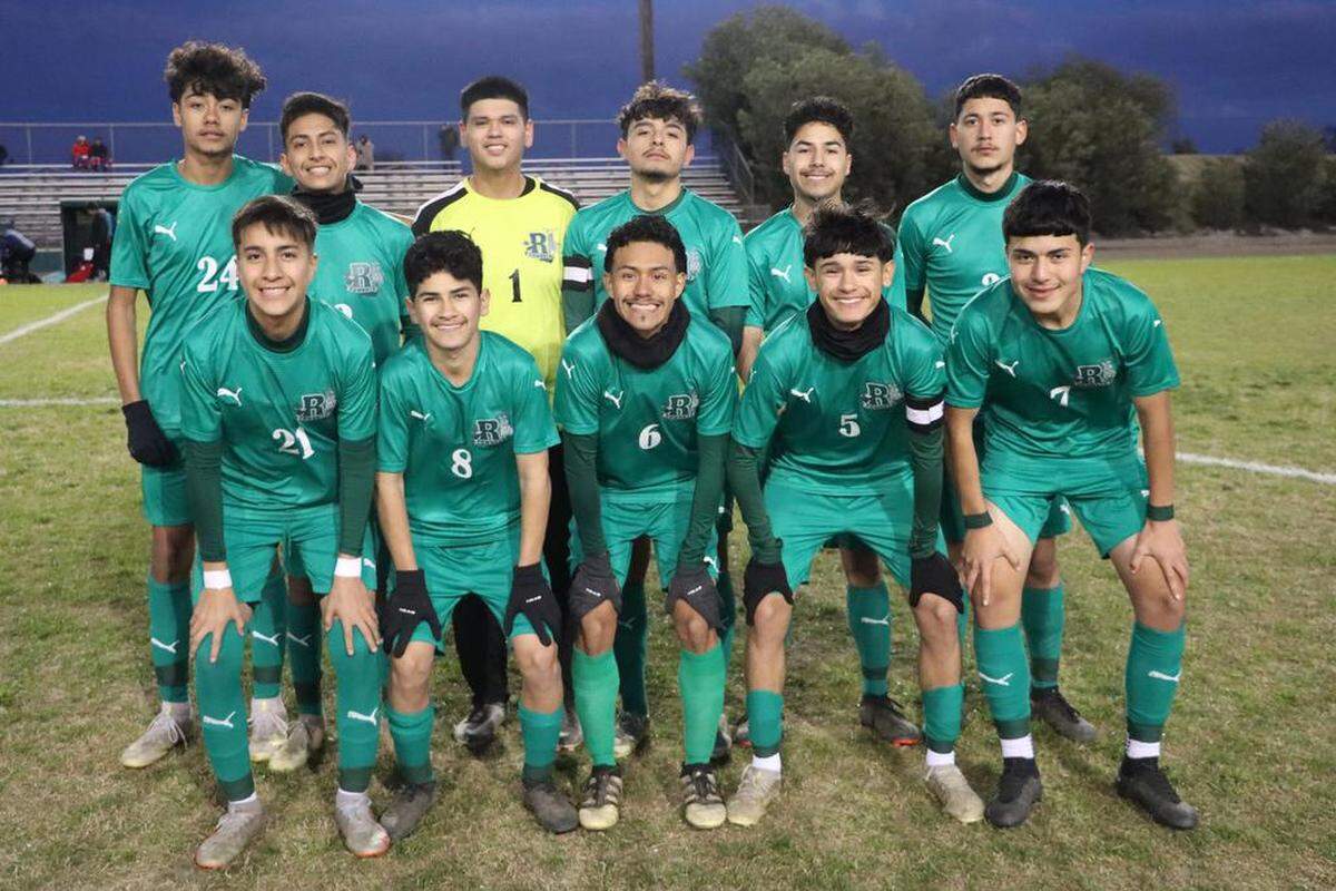 The Riverdale High boys soccer team advanced in the CIF Central Section Division IV playoffs with a 1-0 win over visiting San Joaquín Memorial on Feb. 14, 2014. The top-seeded Cowboys improved to 18-4-4.