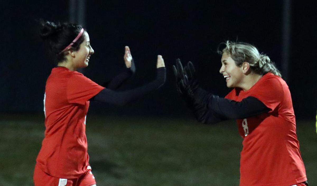 Fowler High sophomore forward Melayna Vásquez (right) gets congratulated by a teammate after her first-half goal against Reedley High during a CIF Central Section Division IV girls soccer match on Feb. 15, 2023 at Fowler High. Second-seeded Fowler advanced with a 5-0 win.