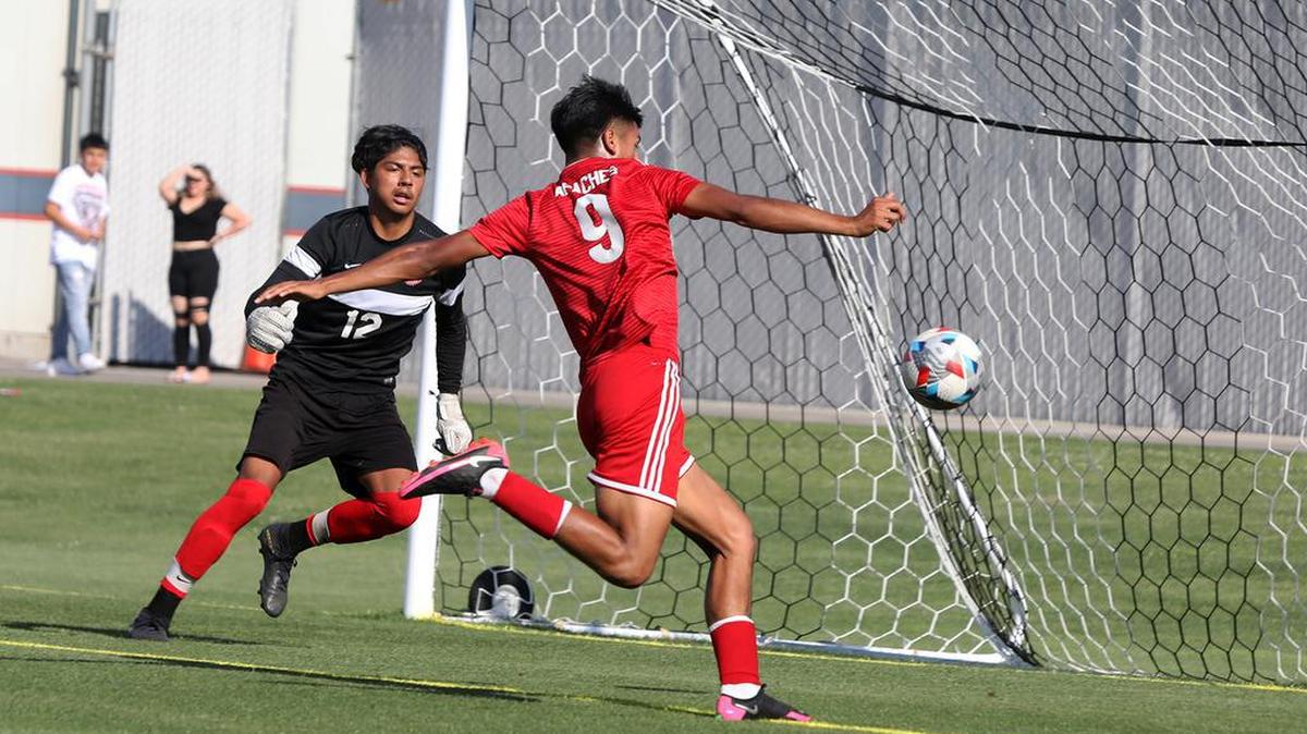 Sanger High sophomore forward Isaiah Villalobos failed to score on this play against Hart High goalie Jaime González.