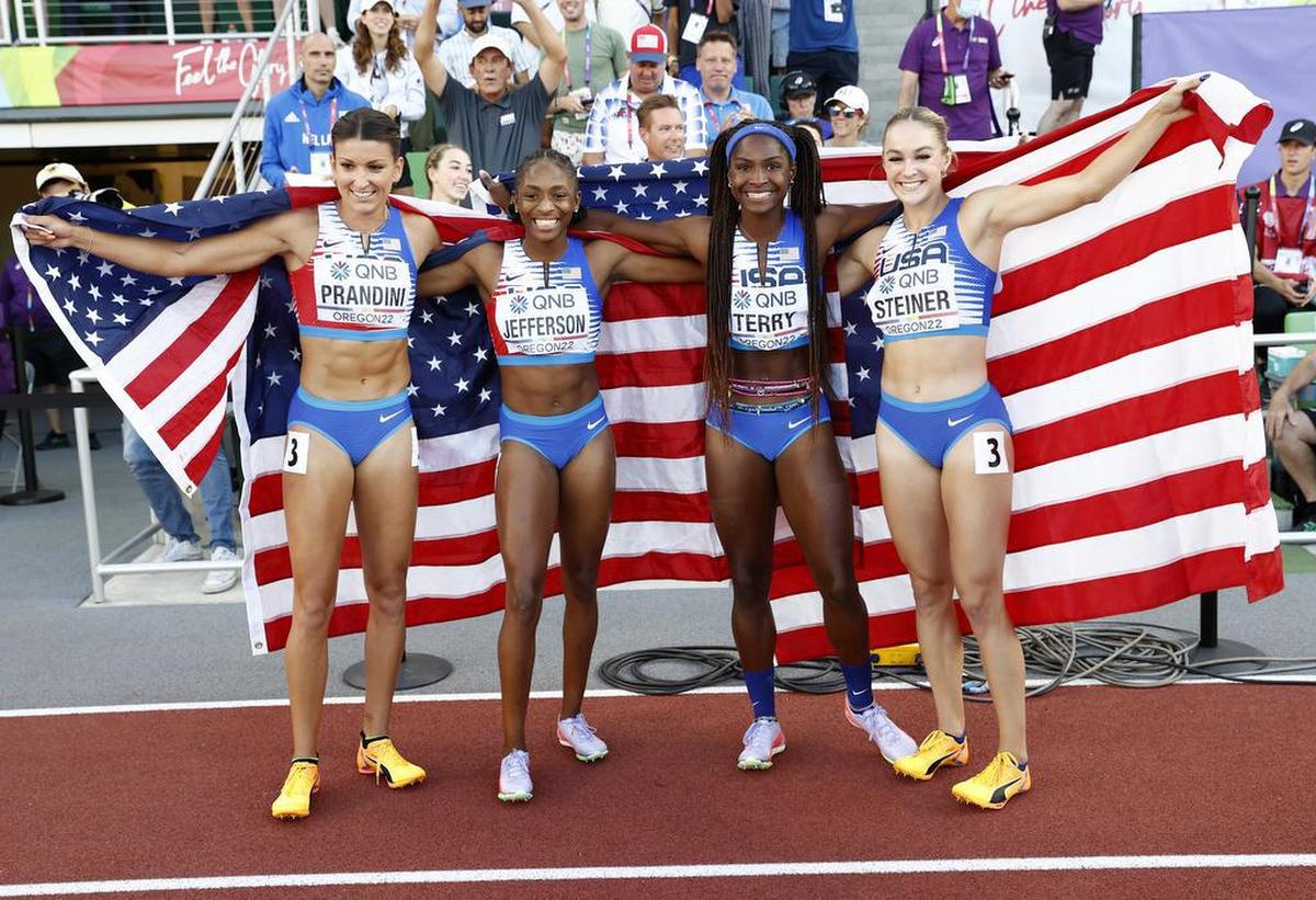 U.S. athletes Jenna Prandini, Melissa Jefferson, Twanisha Terry and Abby Steiner of the US celebrate winning the 4x100m relay final Championships Oregon22 at Hayward Field in Eugene, Oregon.