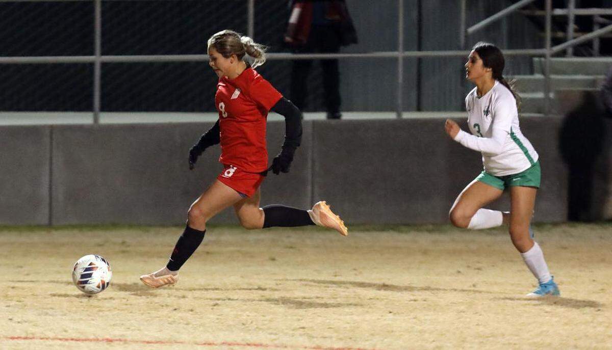 Fowler High sophomore forward Melayna Vásquez drives past Reedley High freshman defender Sienna Ramos during a CIF Central Section Division IV girls soccer match on Feb. 15, 2023 at Fowler High. Second-seeded Fowler advanced with a 5-0 win.