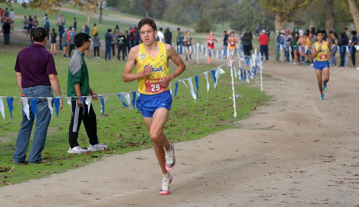 Clovis High junior Christopher Caudillo won the CIF Central Section boys Div. I championship with a time of 15:18.44.