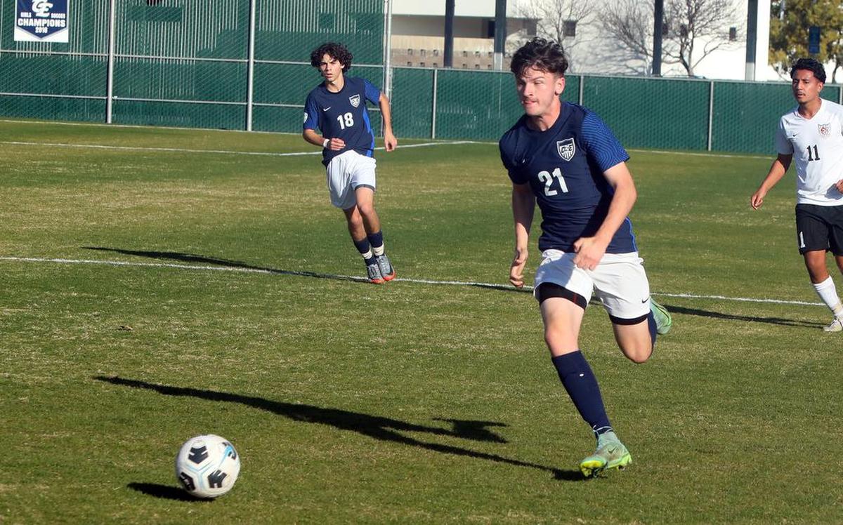 Clovis East junior Tyler LaGrasse sprints down the left side of the field in first-half action against Central High. LaGrassed finished the play with a game-opening goal, but Central pulled out a 2-1 win as both teams tied for the TRAC title.