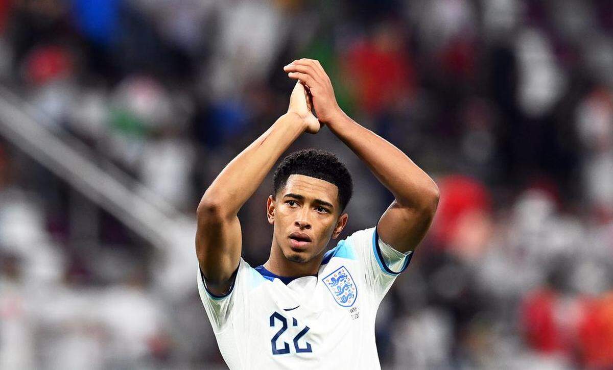 Jude Bellingham of England applauds fans after winning the FIFA World Cup 2022 group B soccer match between England and Iran at Khalifa International Stadium in Doha, Qatar.