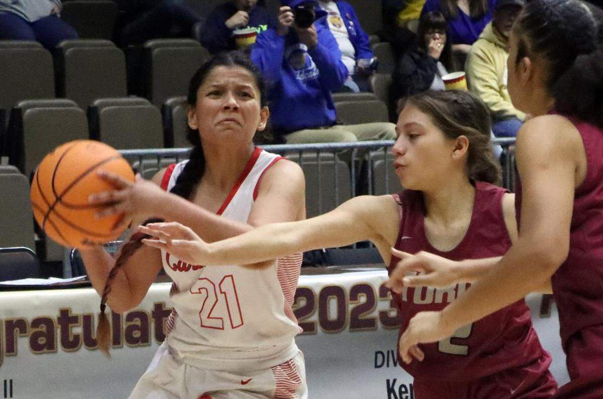 Lindsay High junior Jaden Pérez goes up for a shot against the defense of Torres High sophomore Jasmine García during the CIF Central Section Division VI girls championship at Selland Arena on Feb. 24, 2023. Lindsay won, 53-37.