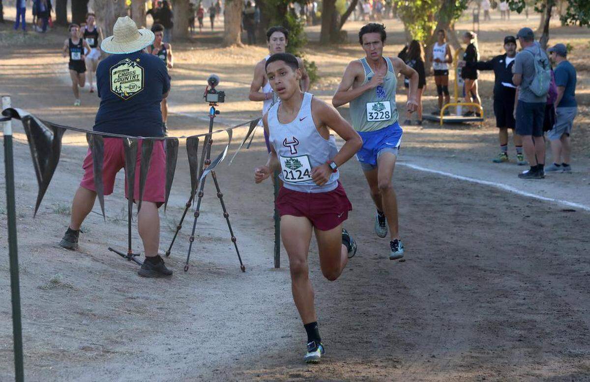 Matilda Torres High freshman Benjamín finished seventh (15:44.0) in the M Varsity race of the 43rd Asics Clovis Invitational at Woodward Park on Oct. 8, 2022.