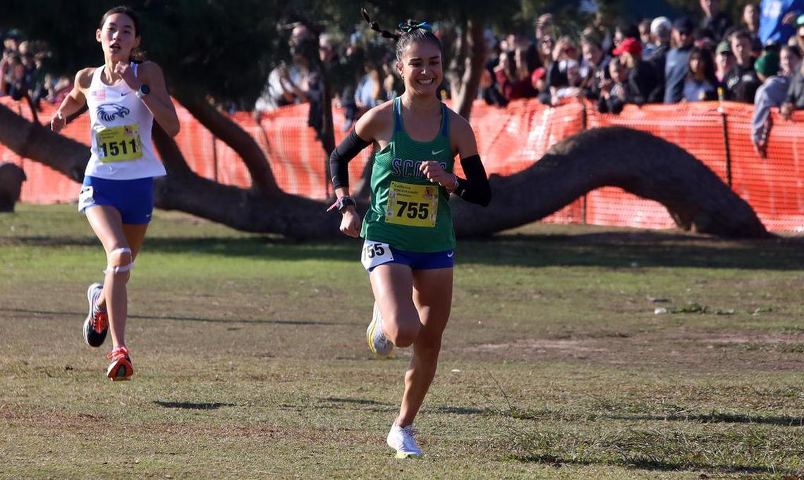 Highland High sophomore Mía Torrecillas placed seventh in 18:10.2 in the girls Division III race at Woodward Park on Nov. 27, 2021.