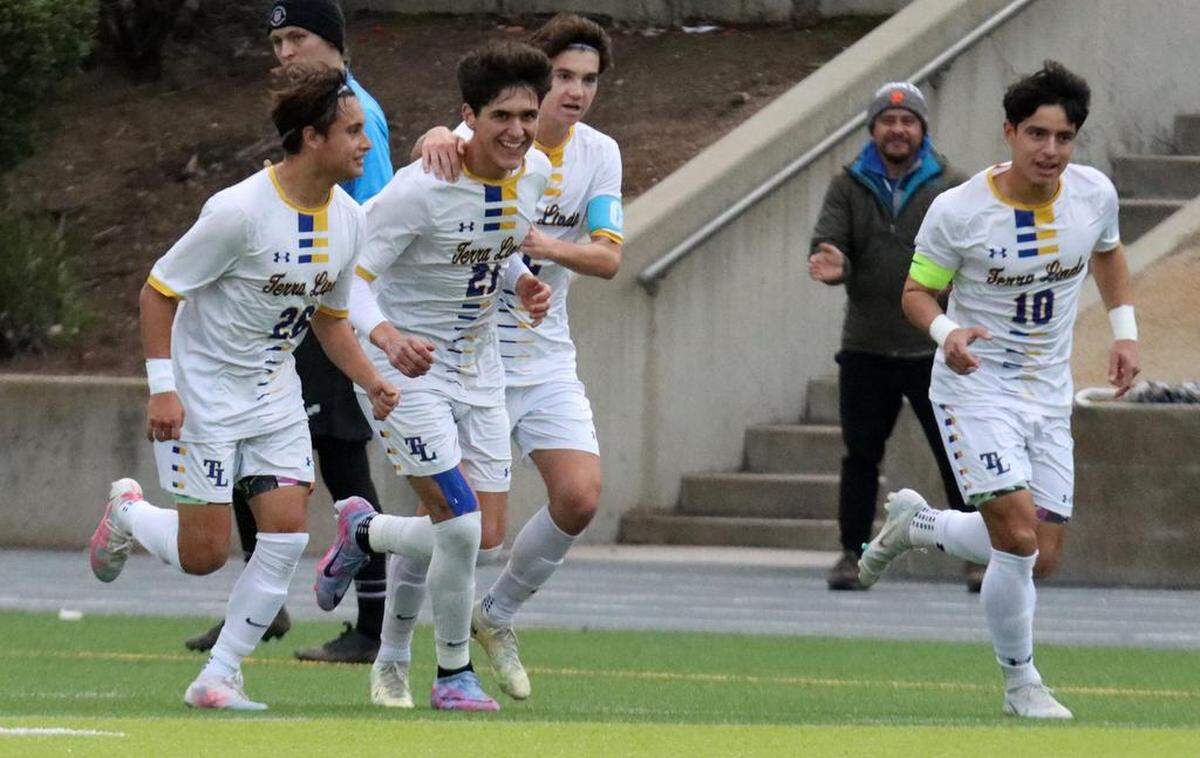 Terra Linda junior Francisco Calvi (No. 21) celebrates his first-half goal against McLane High during the Northern California Division III boys championship match March 4 at McLane High Stadium. Terra Linda won, 2-0.