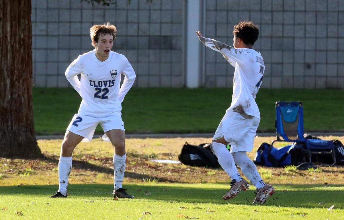 Clovis High sophomore Caleb Farmen (22) celebrates a first-half goal against Clovis North during a TRAC soccer match at Clovis Community College on Jan. 18, 2023. The state’s top-ranked boys team, Clovis North, scored a 2-1 win.