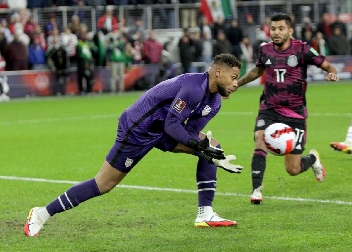 Zach Steffen of the USA in action against Jesús Corona of México during the CONCACAF World Cup Qatar 2022 qualifier soccer match.